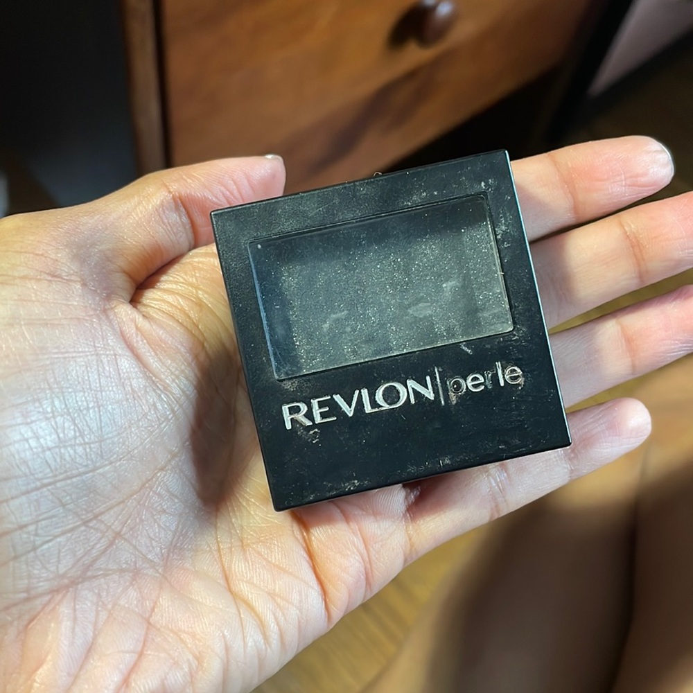 Revlon single eyeshadow in “black galaxy”.
